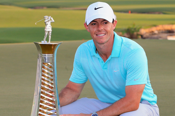 Rory McIlroy of Northern Ireland holds the Race to Dubai trophy at the DP World Golf Championship in Dubai
